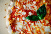 Заказать пиццу в итальянской пиццерии обходится дешевле, чем испечь ее дома