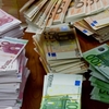 Поток фальшивых евро из Италии во Францию: 22 ареста ​​в Неаполе